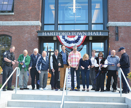 From Left to right: Officer Randy St. Peter, Past Selectboard Members Sam Romano and F.X. Flynn, Selectboard Vice Chair Richard Grassi, Interim Town Manager Steve Locke, Selectboard Chair Chuck Wooster, Selectboard Member Matt Bucy, Selectboard Member Rebecca White, Assessor Michelle Wilson, Past Selectboard Gayle Ottmann, Selectboard Member Alex DeFelice, Firefighter Lucke Harvey. 