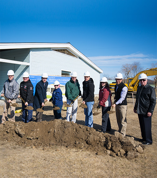 Middlebury Recreation Center (left to right): Peter Conlon UD #3 School Board Chairman, Leonard Barrett MUHS Athletic Department, Peter Burrows ACSU Superintendent, Terri Arnold Parks and Recreation Director, Dean George Selectboard Chair, Brian Carpenter Selectboard, Susann Shashok Selectboard, Chris Huston Bread Loaf Corporation VP of Architecture, Mac McLaughlin Bread Loaf Corporation President.