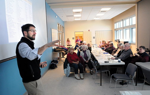 ARCHITECT CHRIS HUSTON speaks Tuesday morning about Middlebury’s new recreation center during the first senior luncheon to take place in the Creek Road facility Independent photo/Trent Campbell